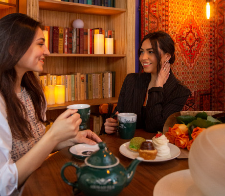 Young People Enjoying Tea